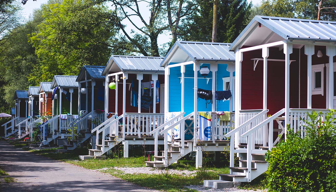 exterior photo of a row of mobile homes