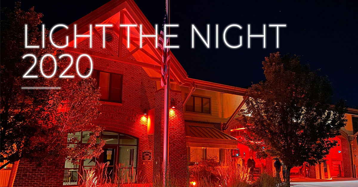 fire station glows red, "light the night 2020"