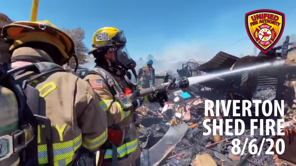 firefighter using hose on structure "Riverton Shed Fire 8/6/20"